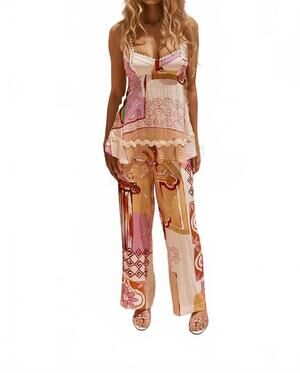 NEW UNKNOWN printed peplum top and pant set in peach